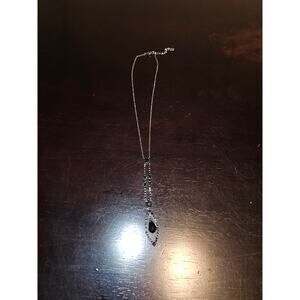 Silver chain necklace with black gemstone accents